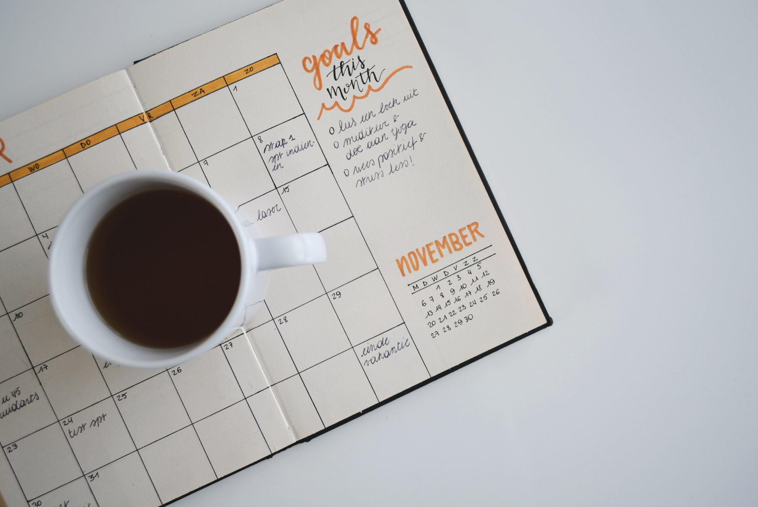 photo of calendar and coffee