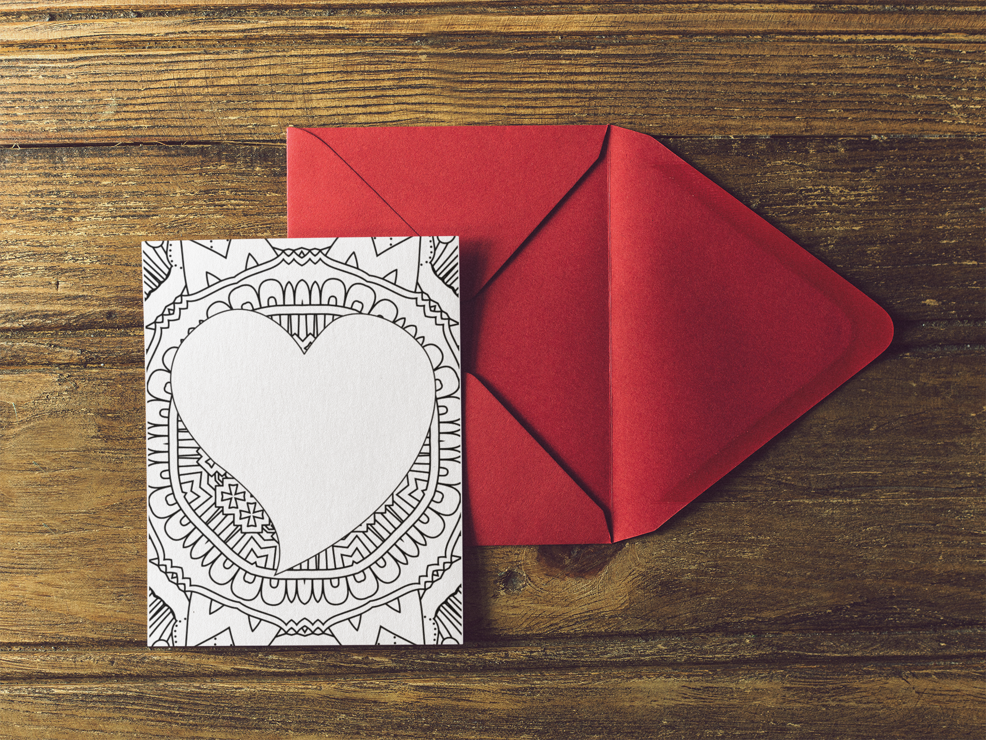 valentines-card-on-a-red-envelope-over-a-wooden-table-a14713